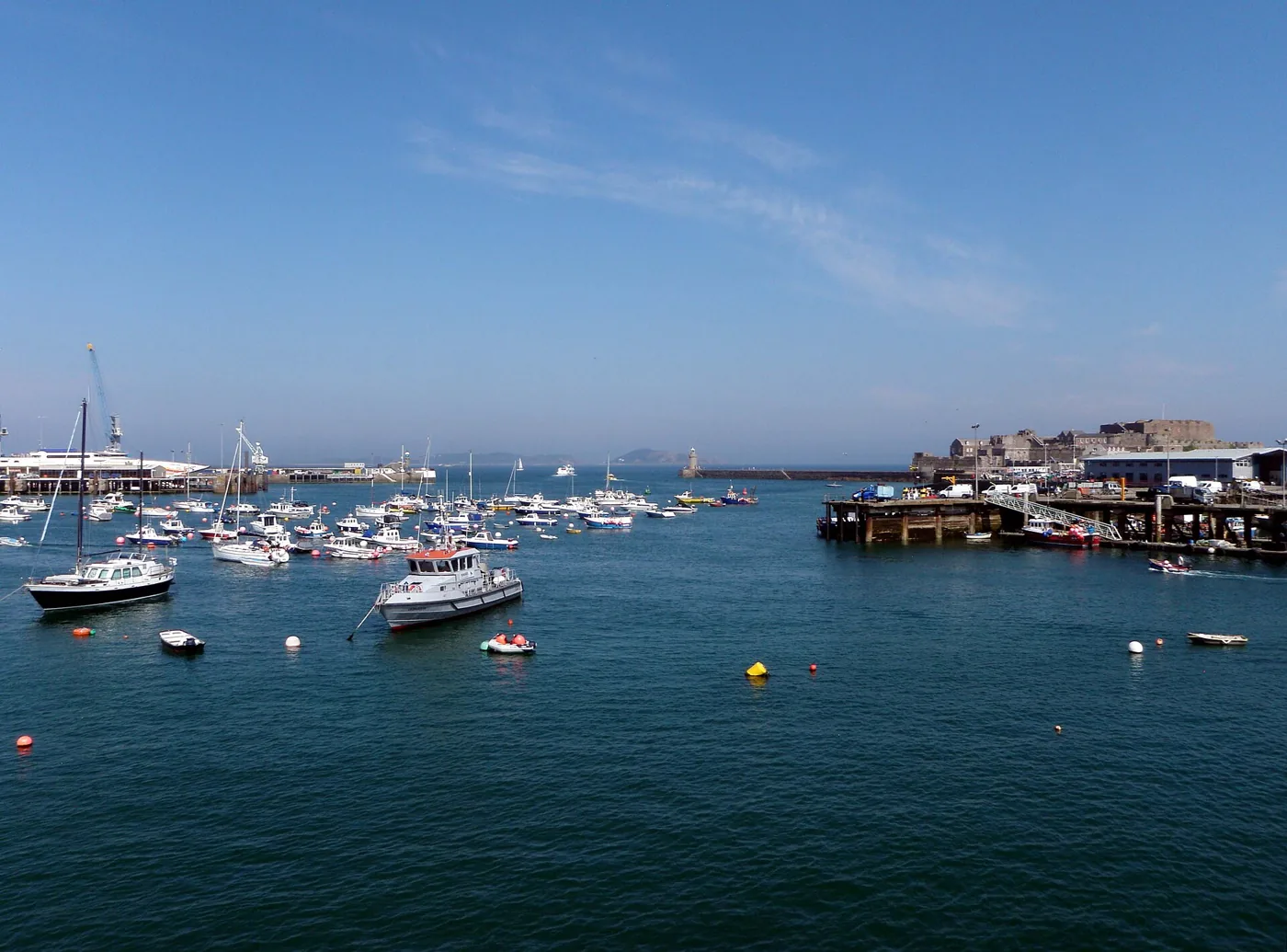 Boats and waterfront buildings at Saint Peter Port Harbour in Guernsey